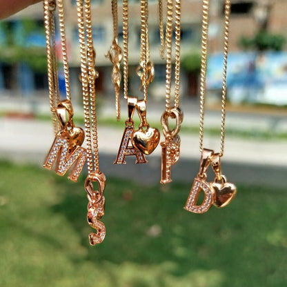 Collar Letra Corazon + Ramito Girasol Oro 18k